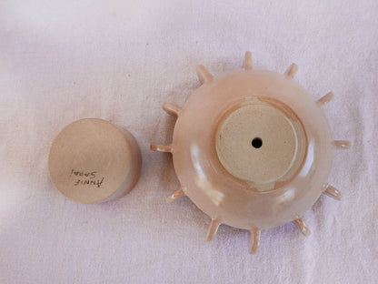 Planter with hand-built sculptural design