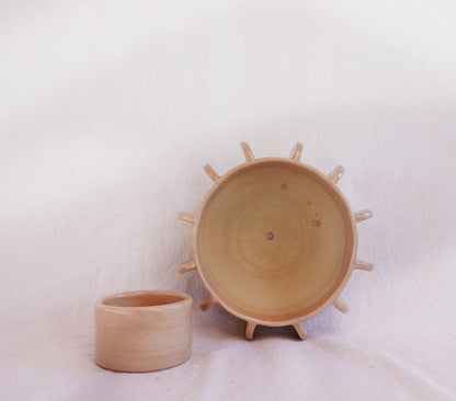 Planter with hand-built sculptural design