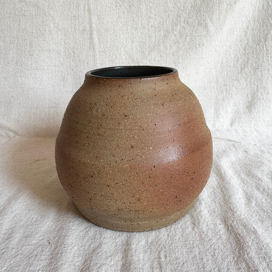 heat-kissed speckled round vase