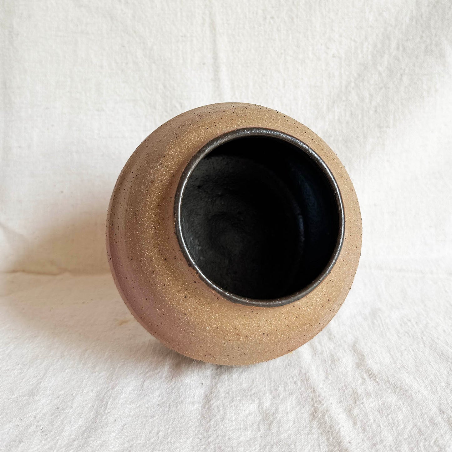 heat-kissed speckled round vase