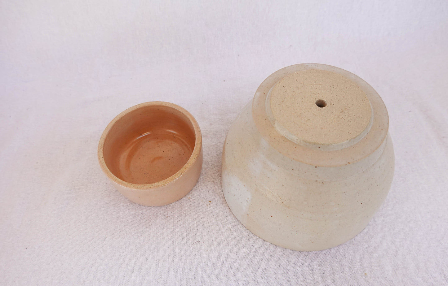 Two-Tone pedestal planter with drainage stand