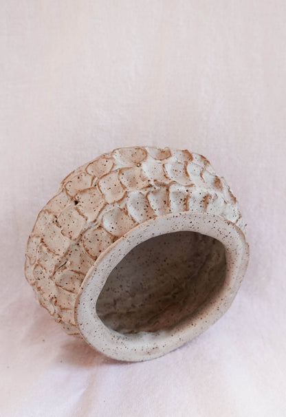dimpled white speckled vase