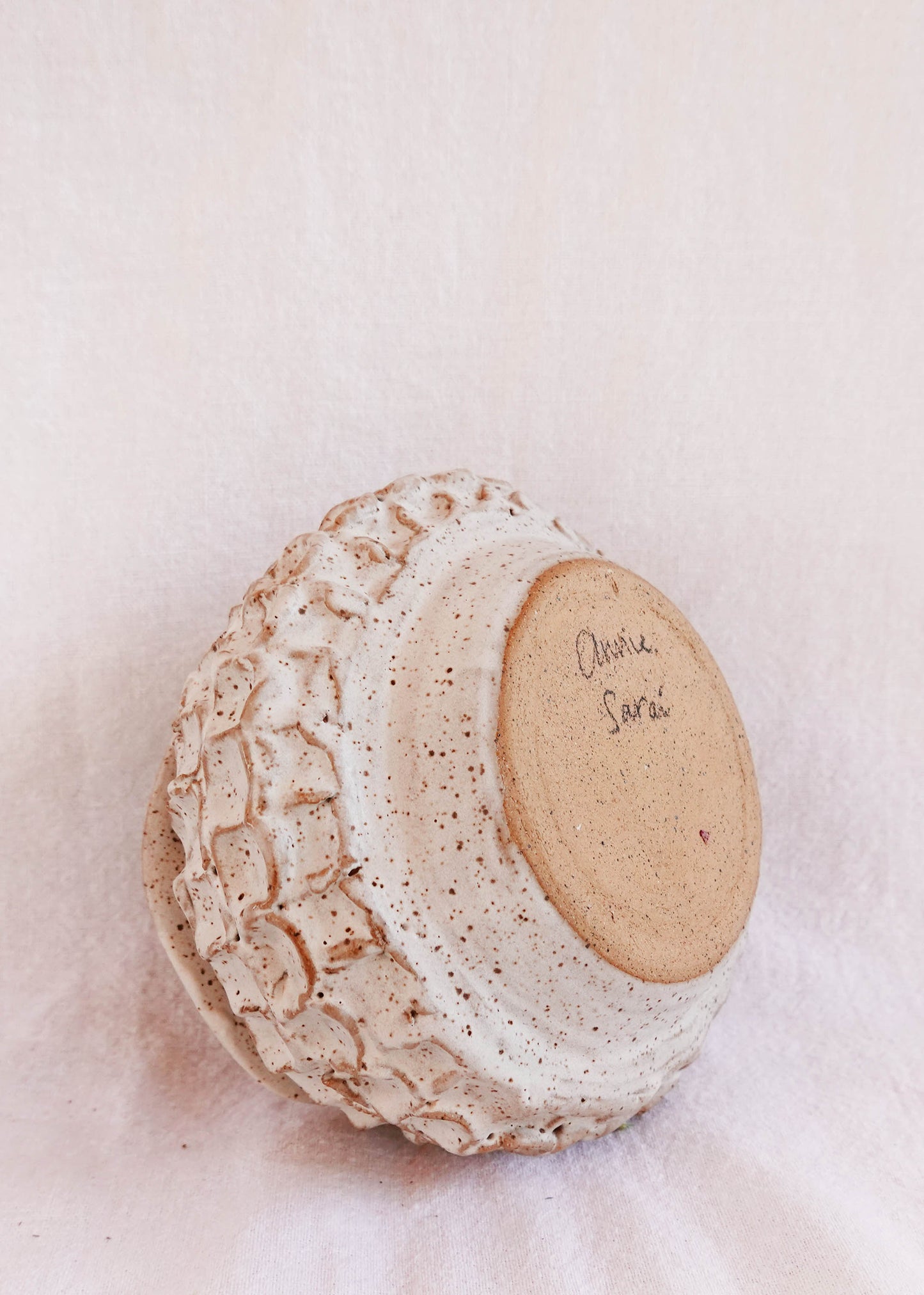 dimpled white speckled vase