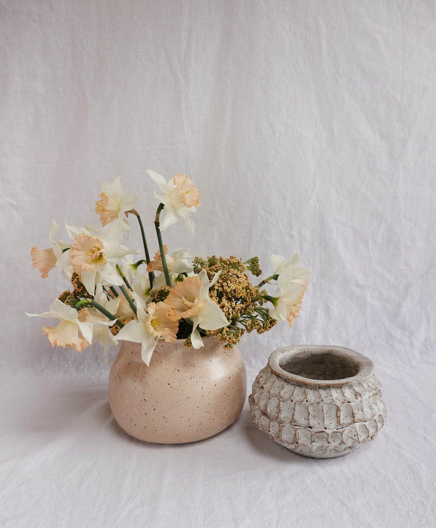 dimpled white speckled vase